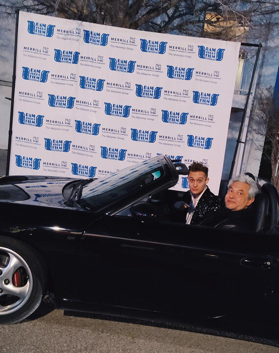 JoJo being driven to the Dam Short Film Festival award ceremony in a black 1990 Porsche 911 courtesy of the Boulder City Cruisin Association